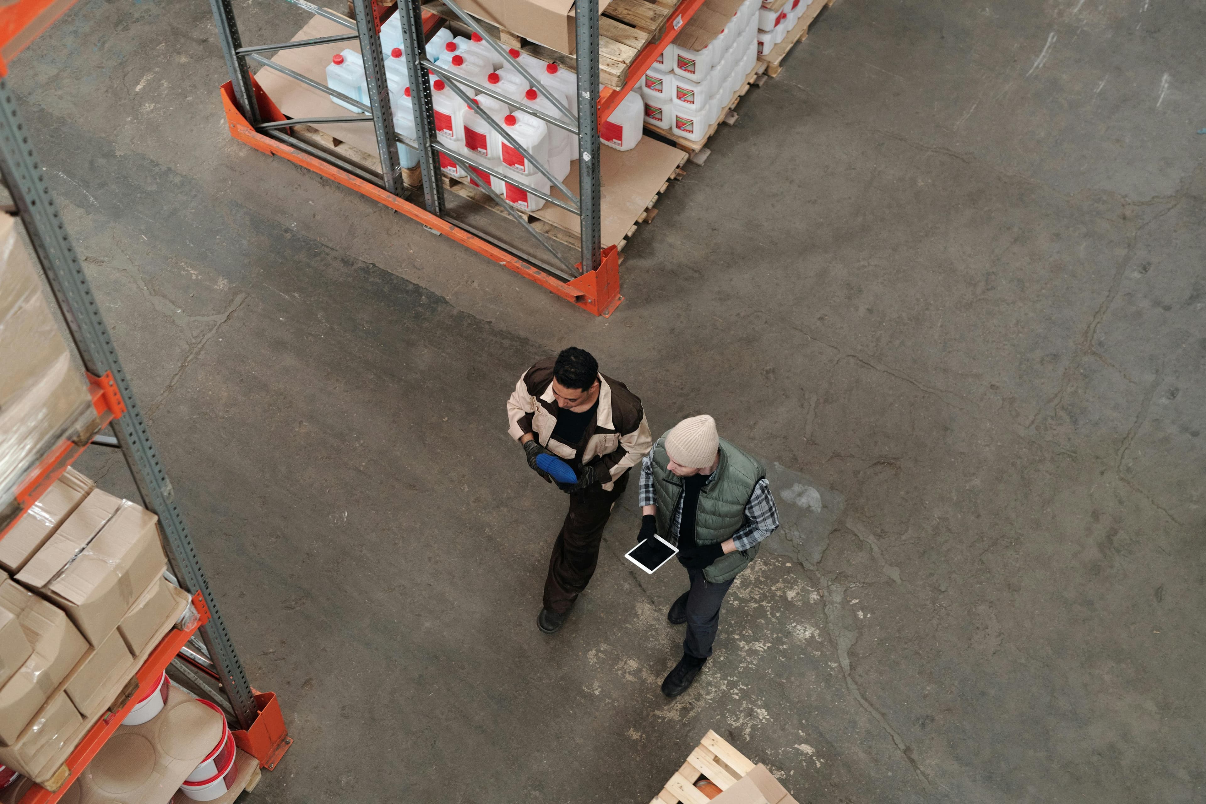 Warehouse workers tracking invenctory